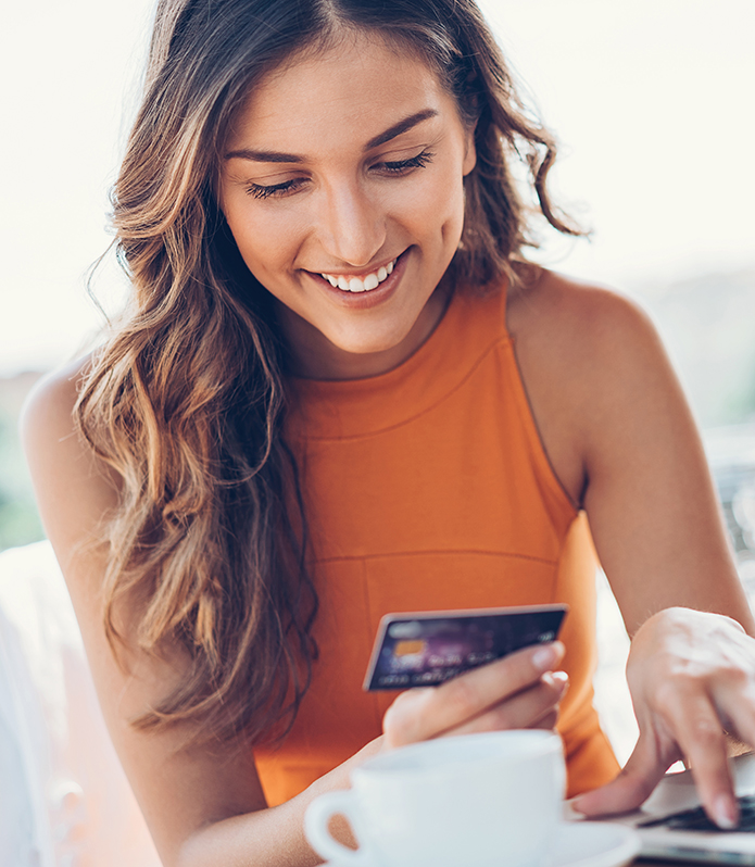 happy woman paying bill