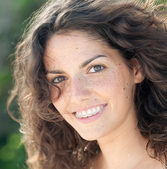 woman with braces smiling