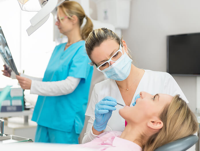 woman receiving a dental exam