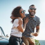 man and woman laughing together