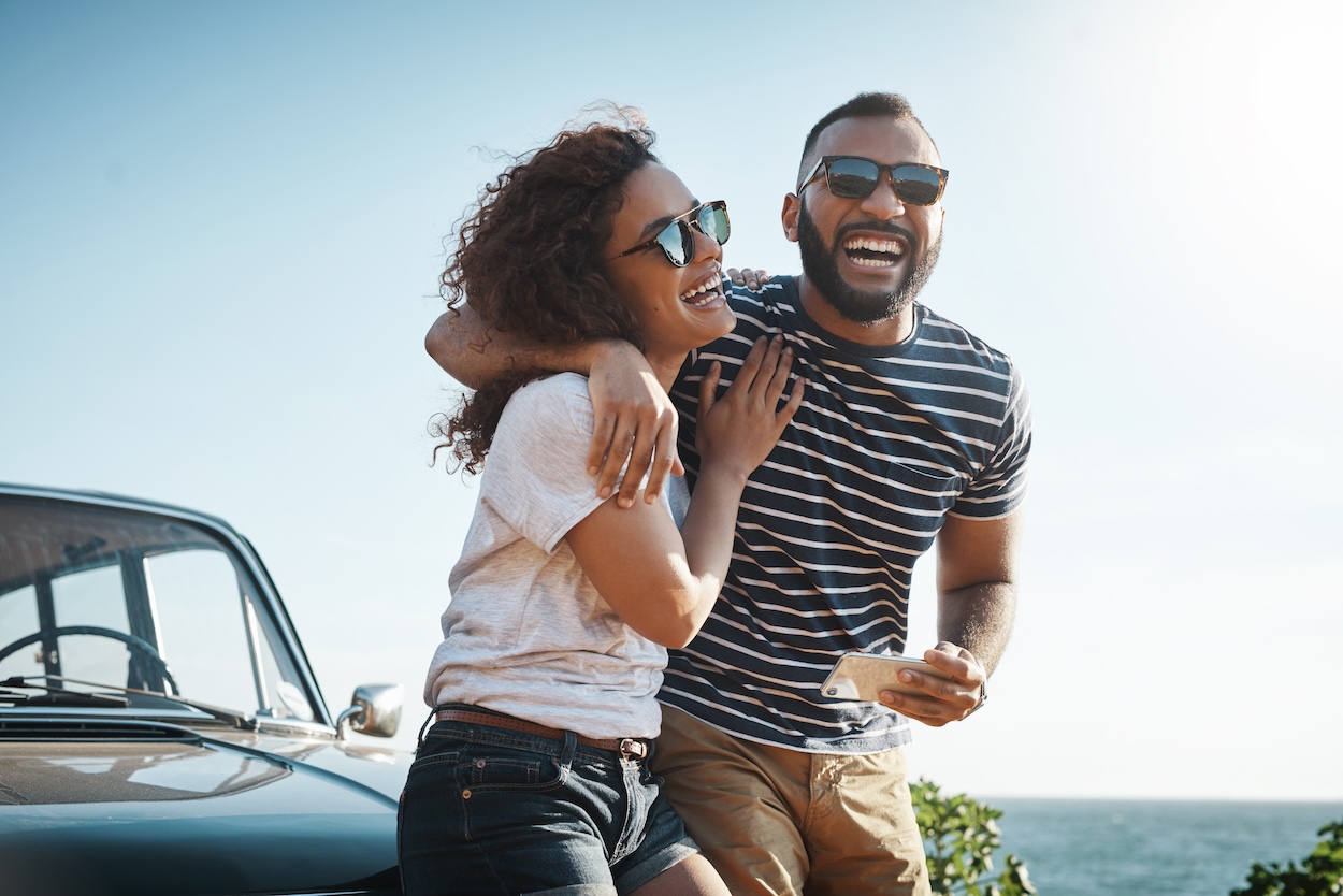 man and woman laughing together