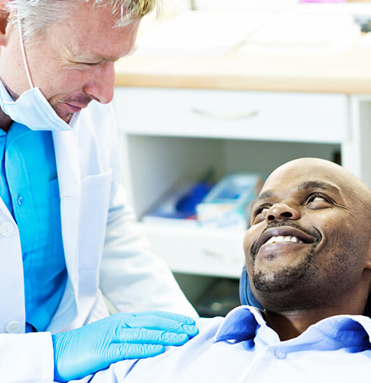 dentist talking with a patient